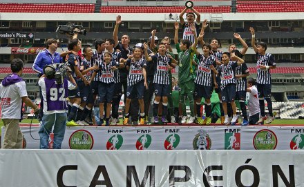 Rayados youth academy players celebrating together